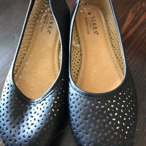 A pair of black flats